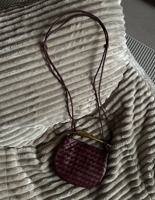 Braided mini Cross body bag with carved handle